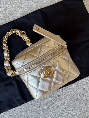 CHANEL Metallic Gold Quilted Mini Cube Vanity Bag with CC Logo, 22C collection